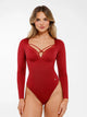 Body modelador manga longa com painel em malha e controle abdominal